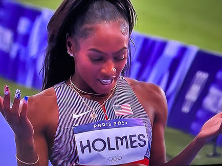Holmes Places Top-10 In Olympic 400-Meters