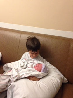 Big brother with baby Samantha