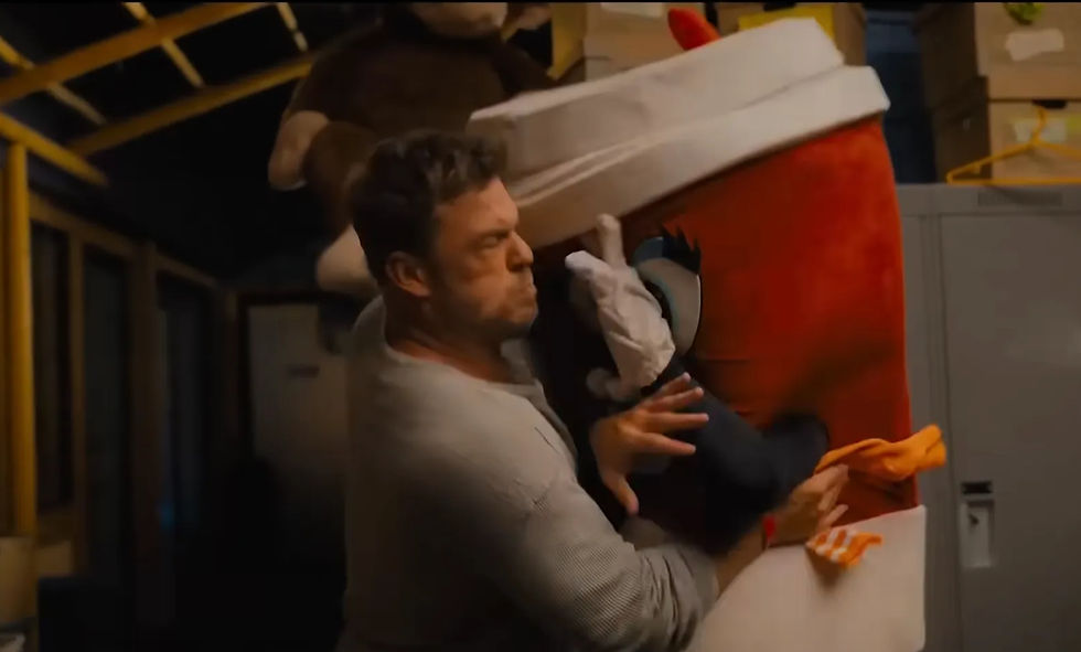 Alan Ritchson fighting a mascot in Playdate Movie