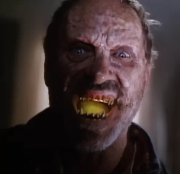 Dick Miller playing Uncle Willy when possessed by The Collector