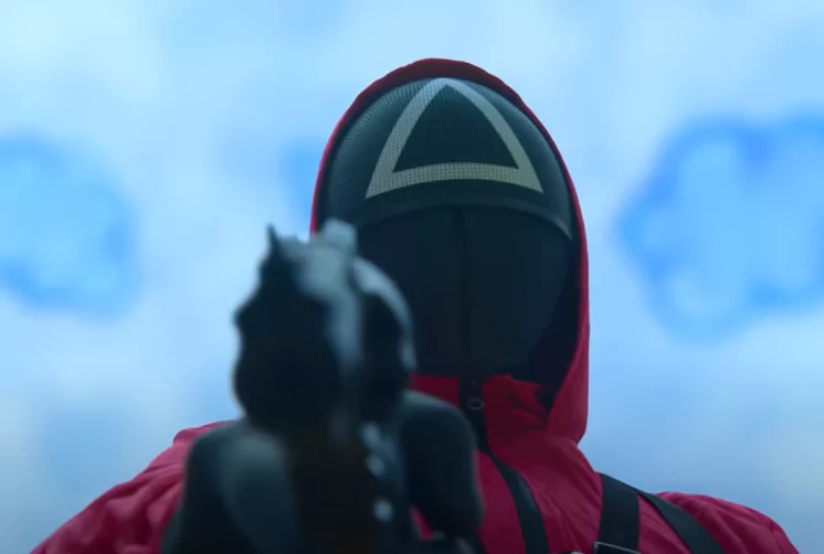 Masked Guard Shooting Someone in Squid Game