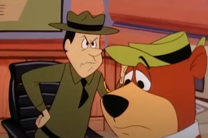 Ranger Smith guilting Yogi Bear in the 60s cartoon