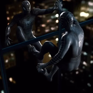 Tobey Maguire in and as Spider-Man wearing a Black Symbiote Suit