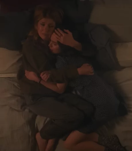 Connie Britton as Elizabeth Rose hugging Sofia Carson as Alex Rose her onscreen daughter