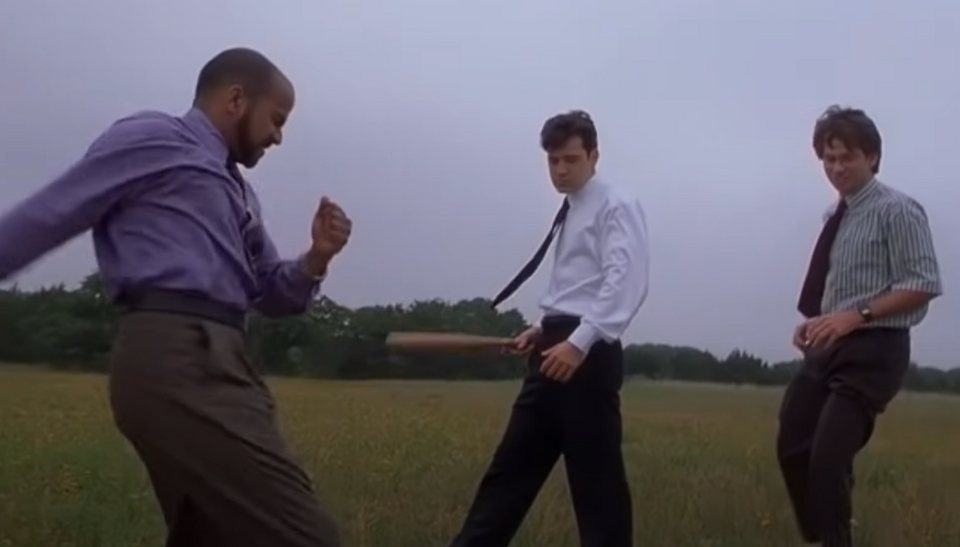 Ron Livingston as Peter Gibbons in Office Space Movie beating up a printer