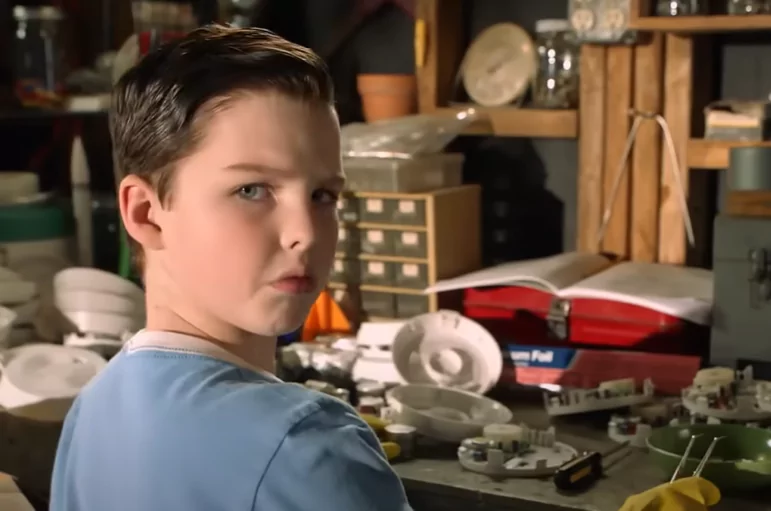 Young Sheldon tinkering with fire alarms to make a nuclear reactor