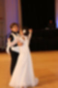 Young ballroom partners dancing