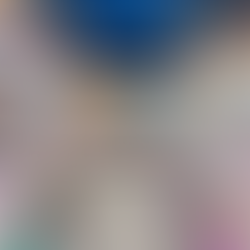 A arcade with several claw machines and teddies inside