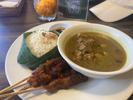 Images of satay, rice and a broth.