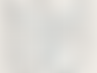 A split-screen architectural blueprint showing both physical office space design on one side and virtual collaboration interface design on the other, with connection lines linking people icons across both environments, emphasizing the integrated approach to social architecture.