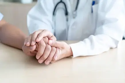 depositphotos_226045874-stock-photo-hand-female-doctor-holding-her.webp