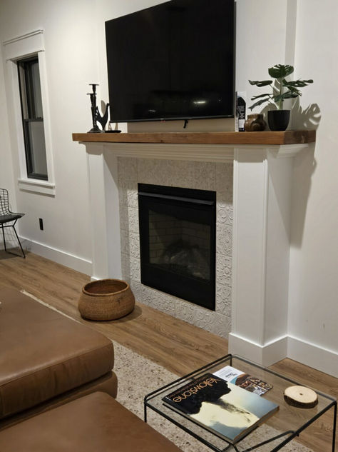 Interior remodeling and fireplace upgrade in San Antonio by trusted roof company.