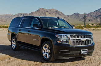 Chauffeur Driven Black Executive SUV parked in the Phoenix, Arizona desert