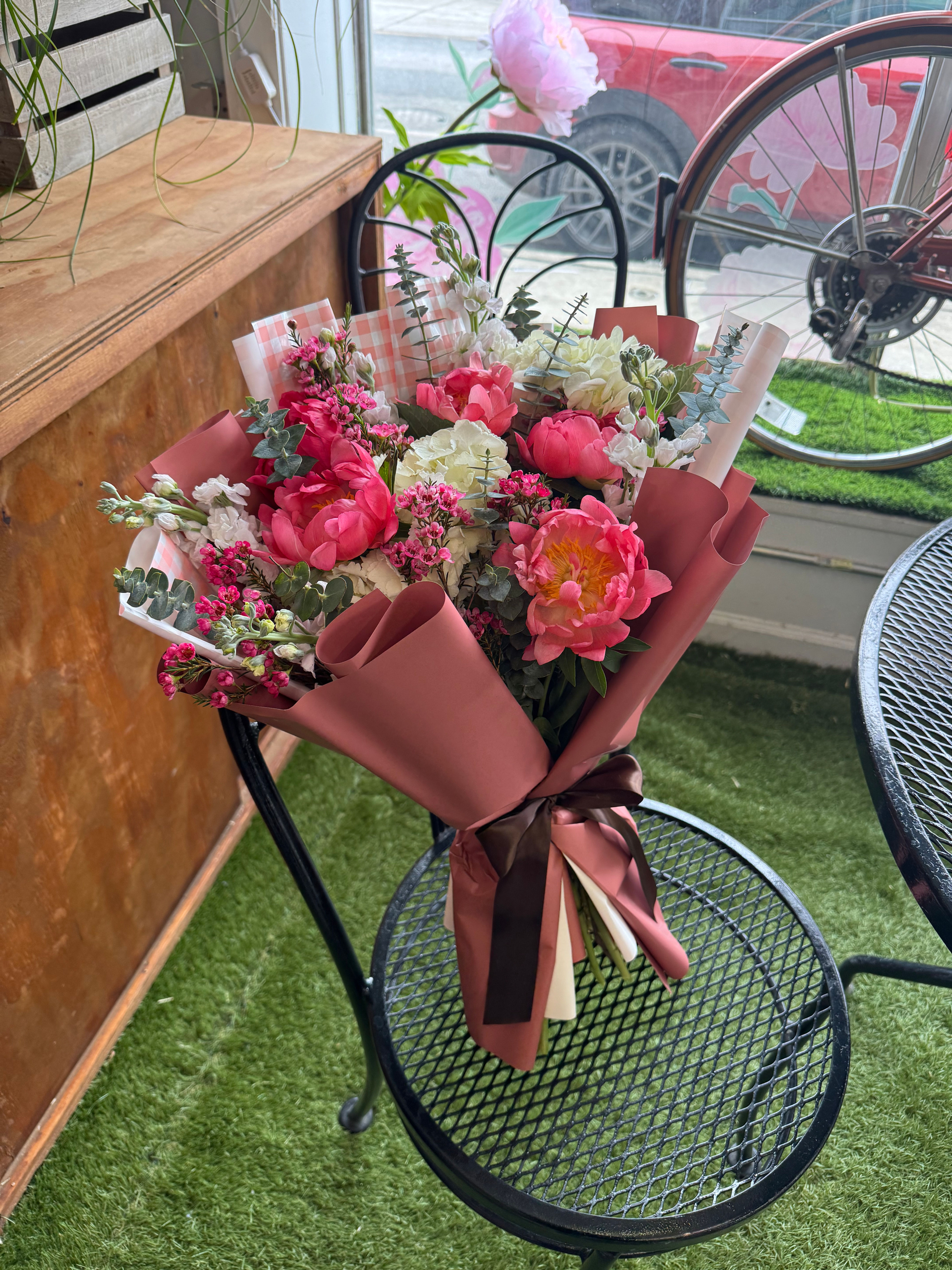 Peonies, hydrangeas, stock, wax flower, eucalyptus 