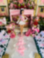 "Beaming with excitement, Poppy proudly wears her bridal sash, ready to strike a pose as the glowing bride-to-be."