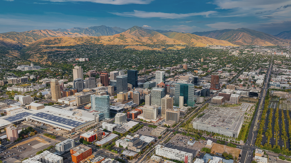 Aerial view of downtown Salt Lake City, Utah, with the Wasatch Mountains in the background.