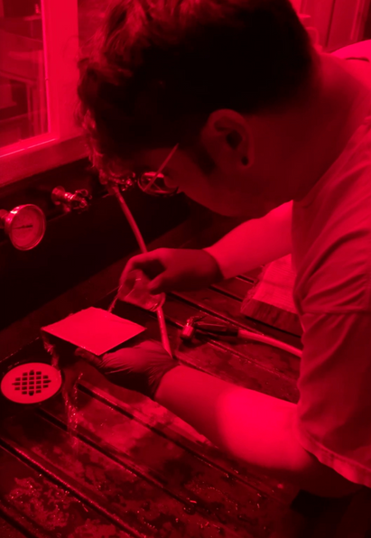 Developing a plate in the darkroom. Experience the custom darkroom at River City Tintype, Louisville, KY