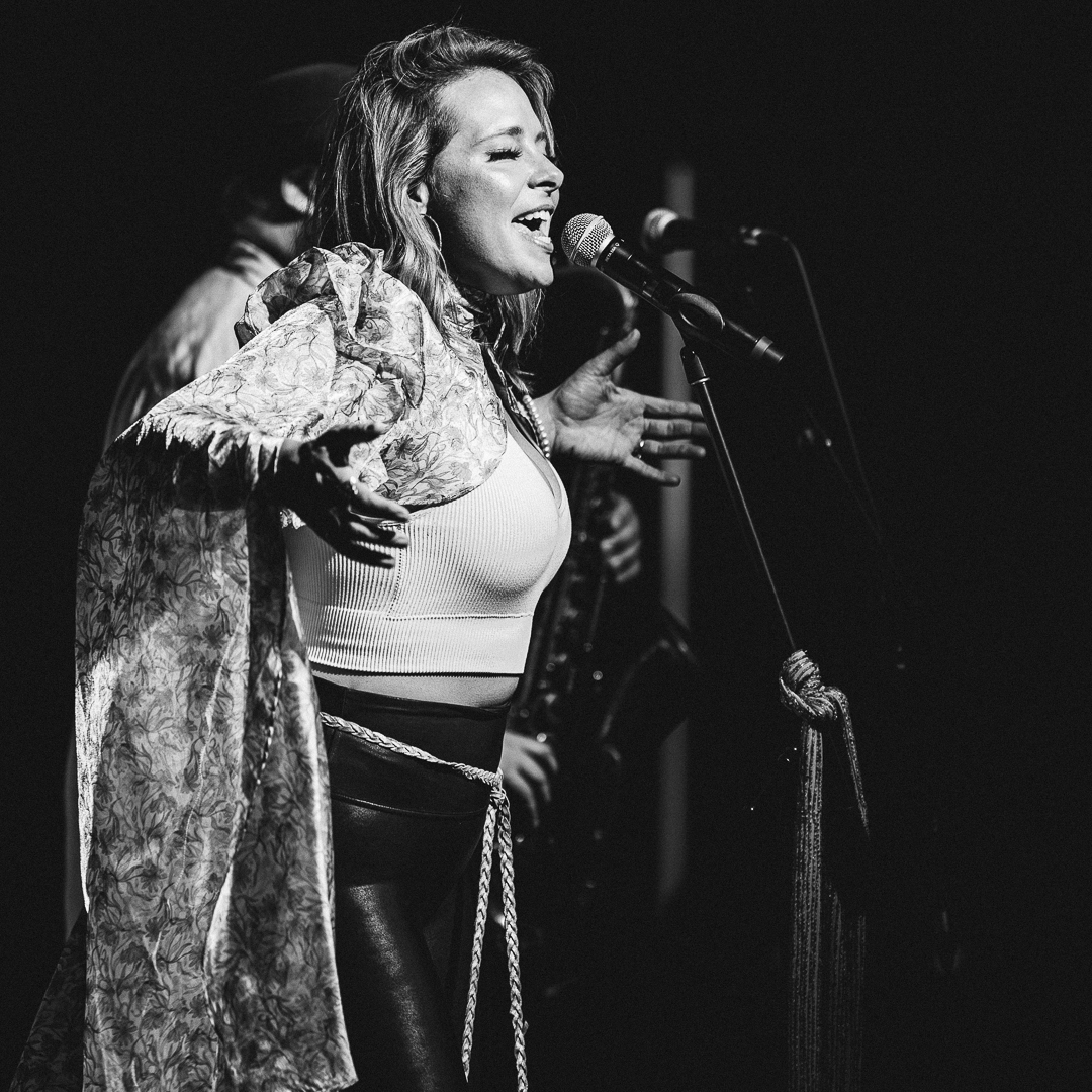 Miss Emily singing with deep soul-blues Americana passion.