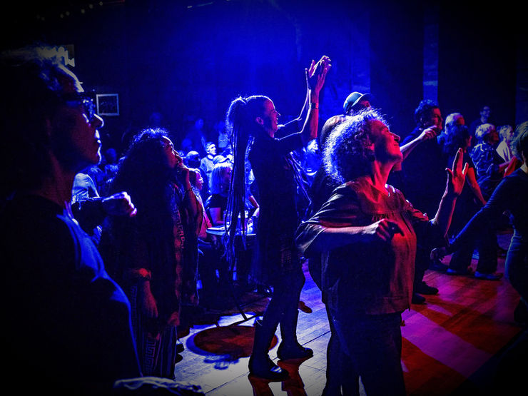 Vibrant concert stage with atmospheric lighting and rock music energy