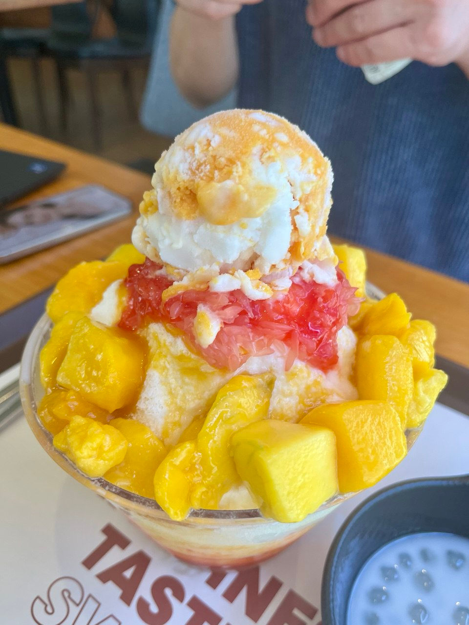 Bingsu with mango, grapefruit, condensed milk, and ice cream