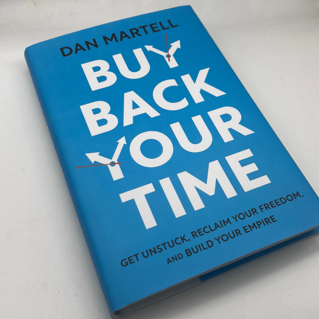 Buy Back Your Time book by Dan Martell on a white surface