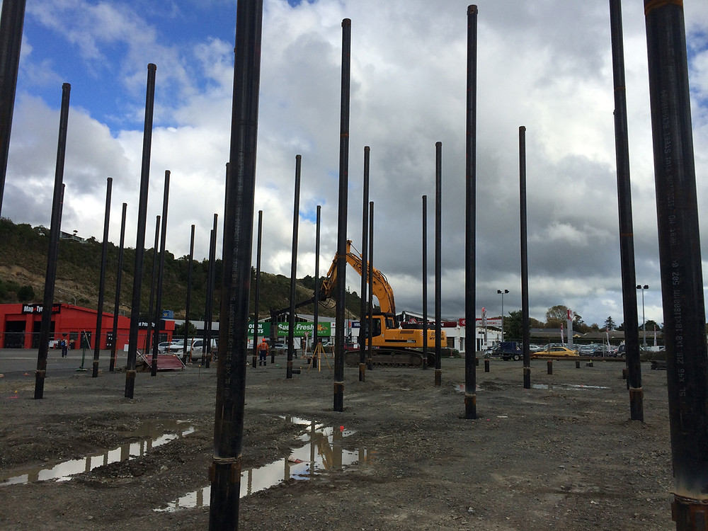 Screw piling in place