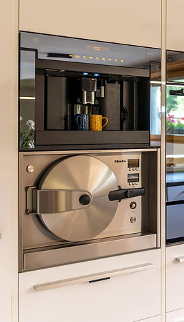 Eingebauter Dampfgarer, Kaffeemaschine und Backofen
