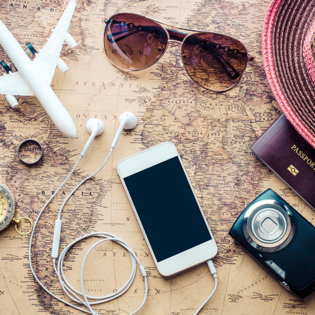 iphone, earbuds, airplane, camera, hat, compass