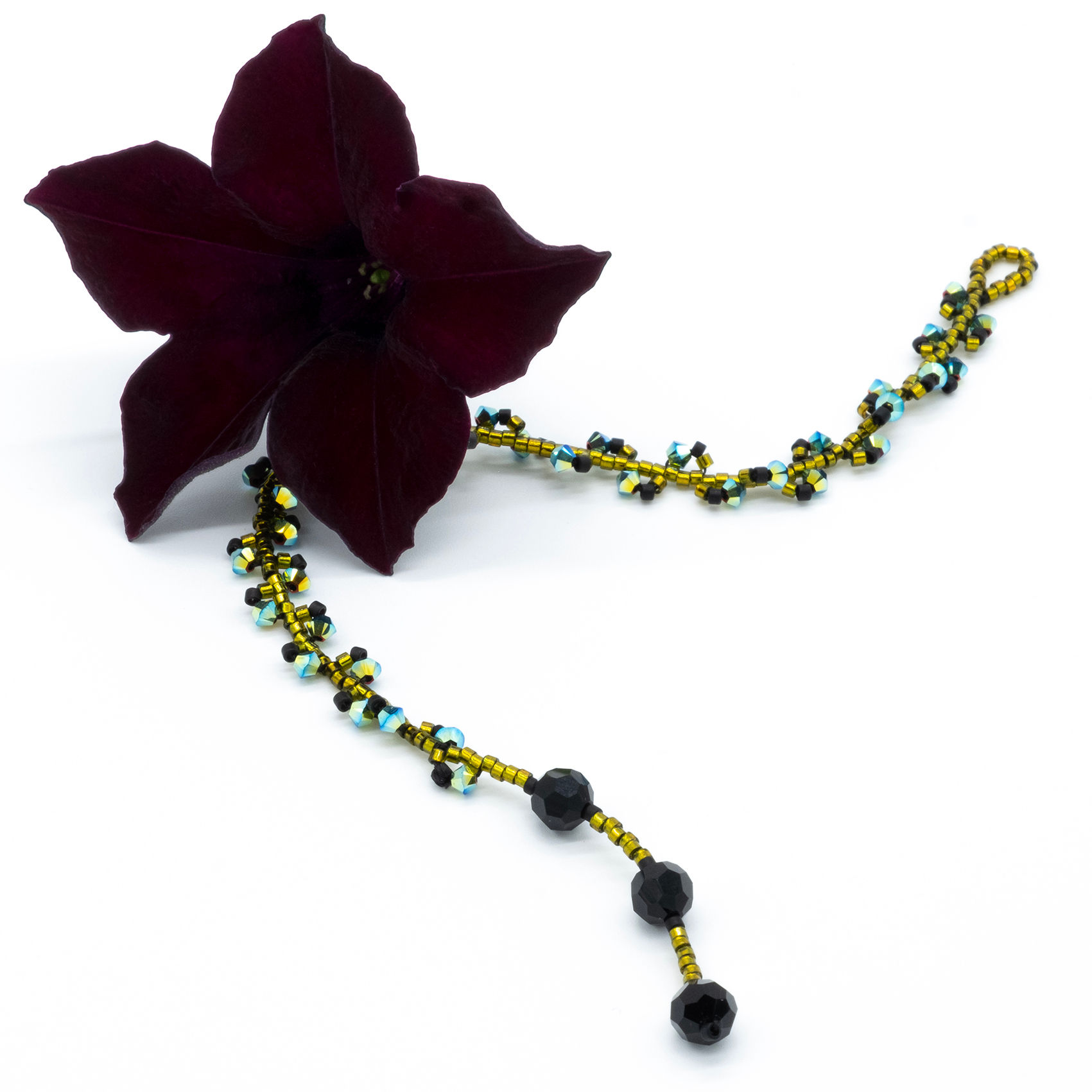 Berries golden bracelet with black, turquoise and multi-colored splashes