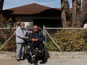 Farmworker Ramon Sonoqui, 70, sits for a portrait with his wife Maria Carrillo