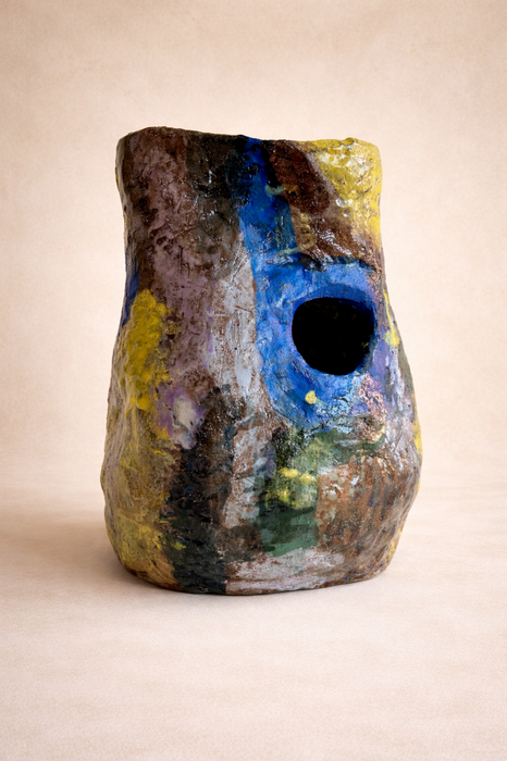 Handcrafted ceramic vessel by Tahnee Brandt with layered brown, green and blue glaze, textured sculptural surface, front view
