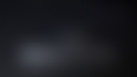 Close-up of a digital assistant interface on a dark screen.
