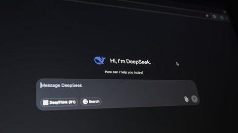 Close-up of a digital assistant interface on a dark screen.