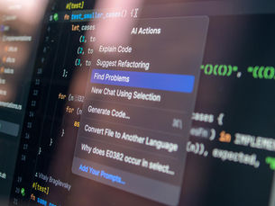 Close-up of AI-assisted coding with menu options for debugging and problem-solving.