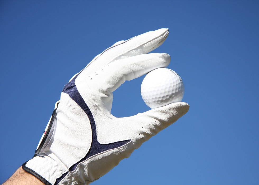 Golfhandschuh und golfball