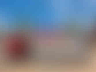 Fashion influencer JJ Royer poses with Steve Royer in Aruba