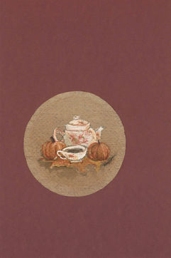 a teapot , teacup, and pumpkins painted on a tea bag