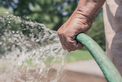 Watering lawn with hose is inefficient