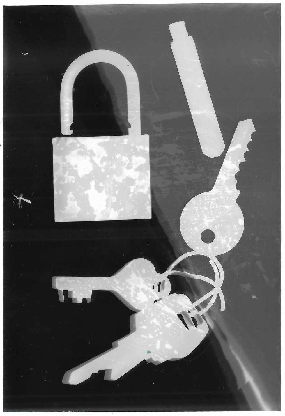 A photogram made using lock and keys