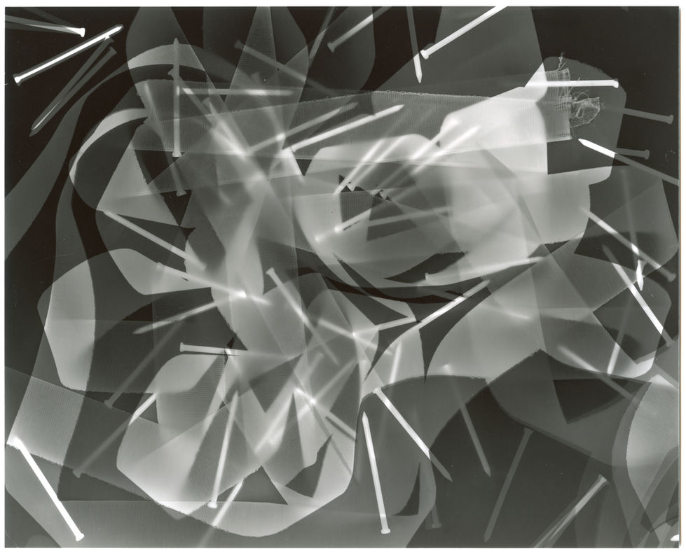 A photogram made using ribbons, nails and cotton