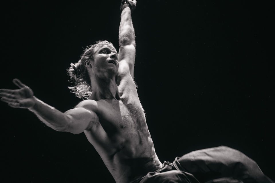 Eric Hardy performing on aerial straps at Synergy