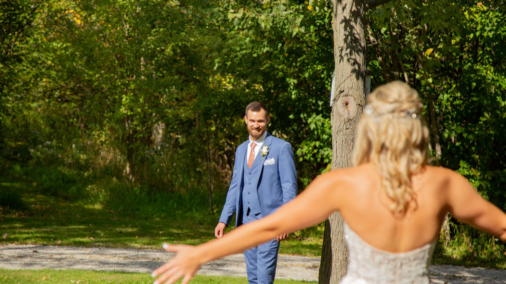 Zach turns to his bride for his first look