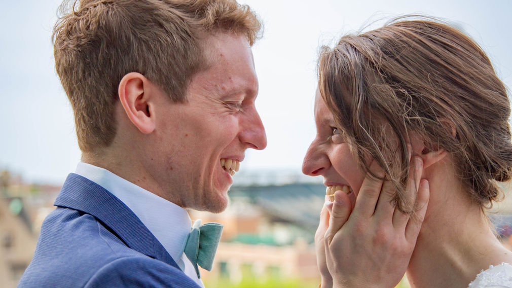 Bride and groom share a special moment on the rooftop of the Madison