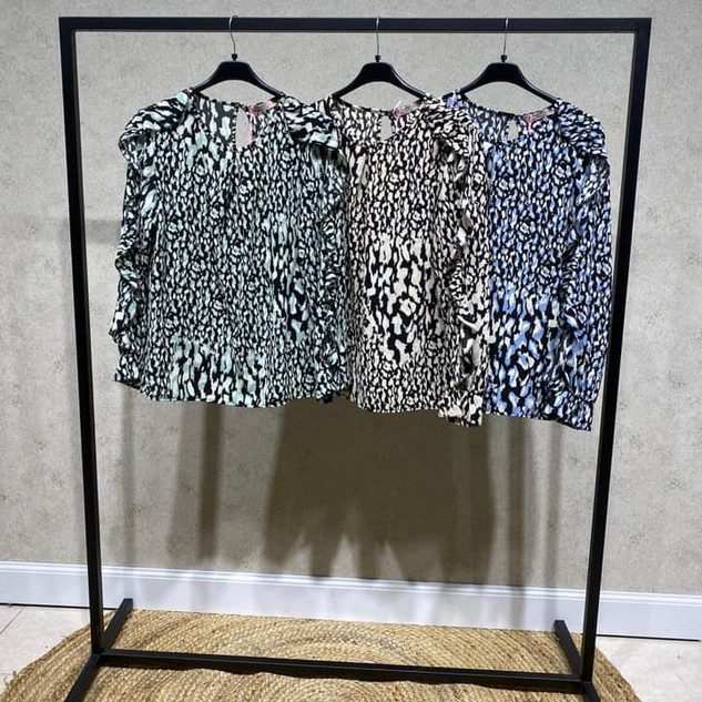Blouse vlekken met roezel op hele mouw