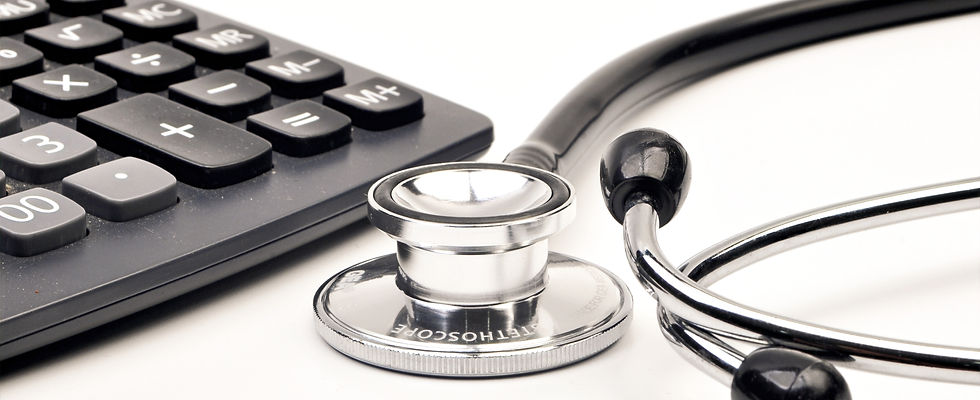 Calculator and stethoscope white backgro