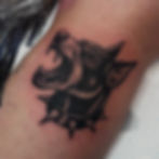 Jade Wildman tattoo bold blackwork traditional doberman tattoo on leg female
