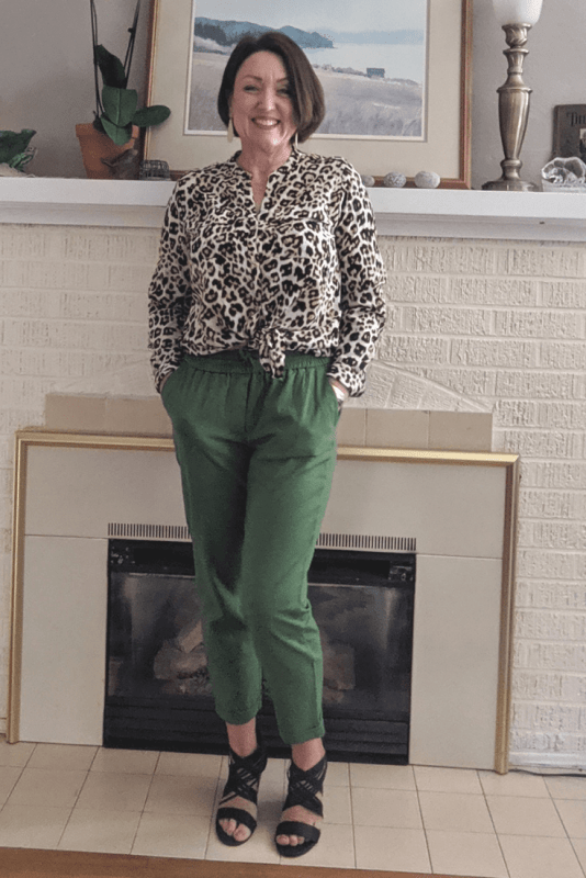 Leopard print blouse with green linen joggers make a fun date night outfit.