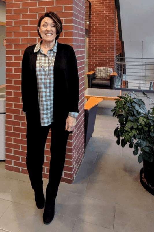 This black Side Button Cardigan is a great layering piece for the office.