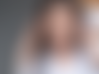 A woman who made mistakes in marketing cradles her head in her hands in frustration