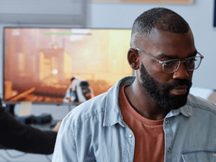 A man exploring different coding careers on a desktop computer